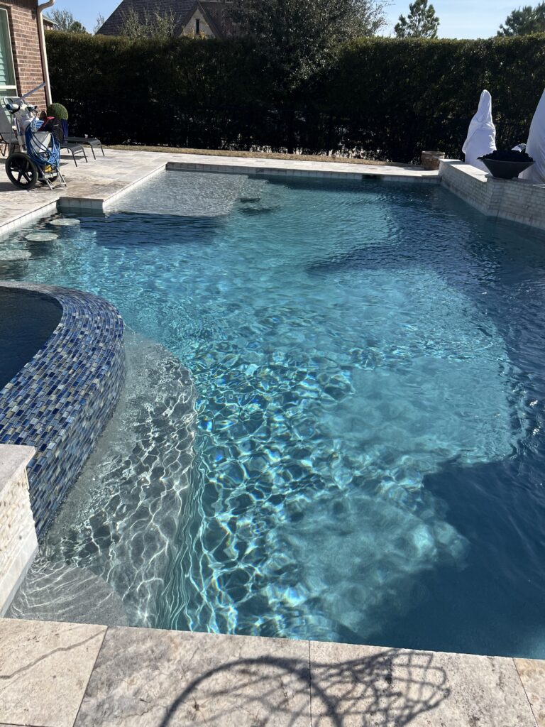 Crystal Clear Backyard Swimming Pool After Maintenance